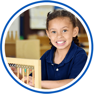 An elementary student doing a math activity.