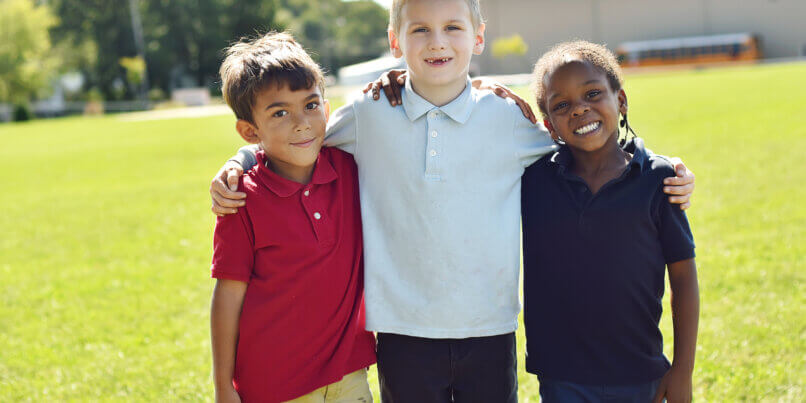 Battle Creek Montessori Academy students pose for a picture together on the schools' campus.